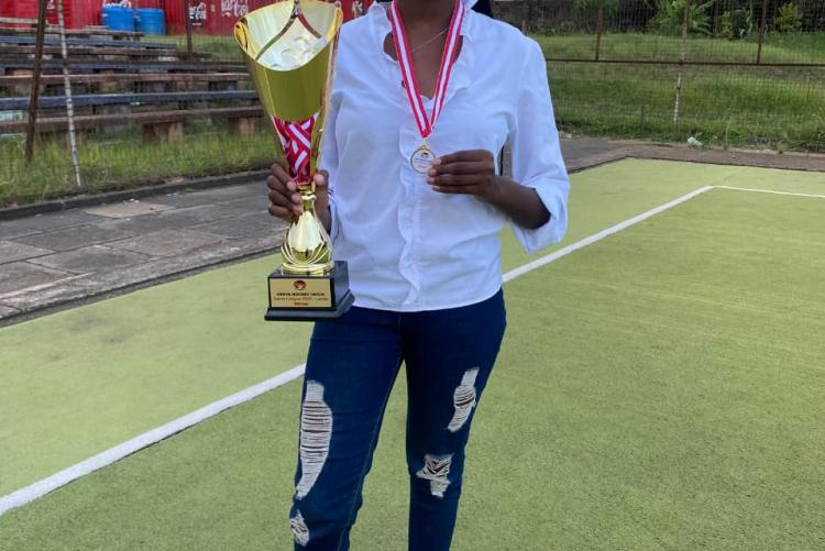 Captain displaying the trophy