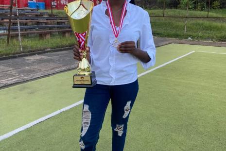 Captain displaying the trophy