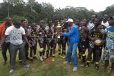 Mean Machine posing with the trophy