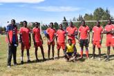 Volleyball men team pose for a photo