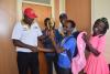 Director  of Sports presenting the trophy to tennis men captain