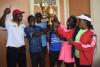 Director  of Sports presenting the trophy to tennis men captain