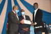 UoN Sports Volleyball  captain receives an Award from the UoN Vice Chancellor 